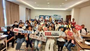 旅宿職涯推廣活動紀念合影，展現21世紀全球外勞集團支持外籍勞工、促進職涯發展的熱情與凝聚力。.